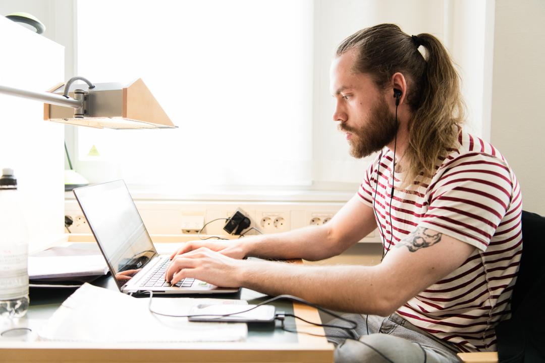 Student studying at a table.